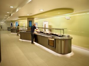 People grabbing food at the College Lane Forum refectory